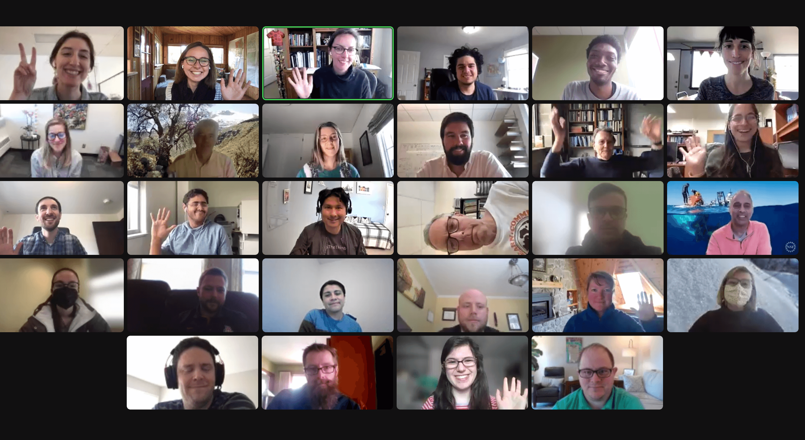 screenshot of zoom attendees smiling and waving. in 6 x 5 grid